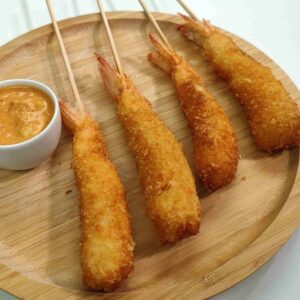 25 Brochetas de langostino empanados